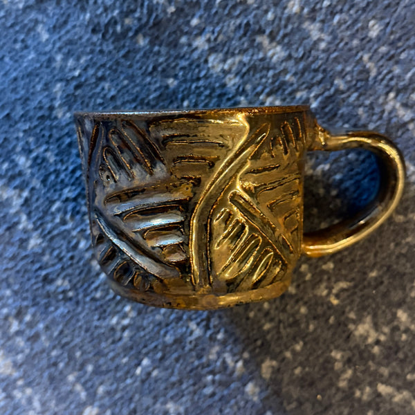 Manifested Pottery 1 - handmade gold glazed carved mug